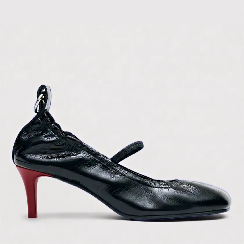 Black patent Mary Jane pump fused with a scarlet stiletto heel from another design