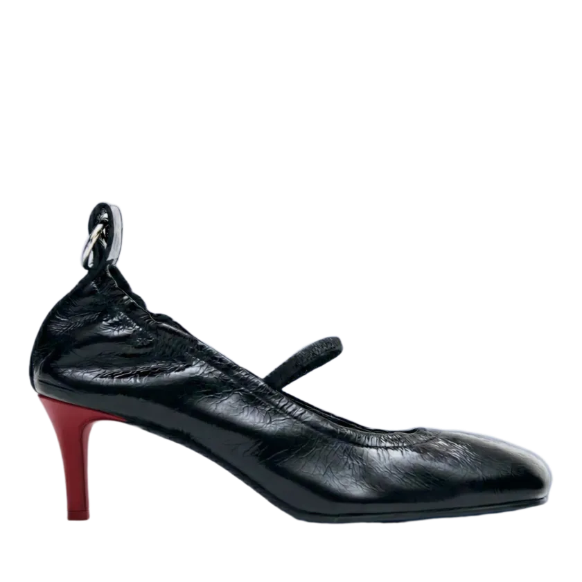 Finished black patent Mary Jane render with the background removed